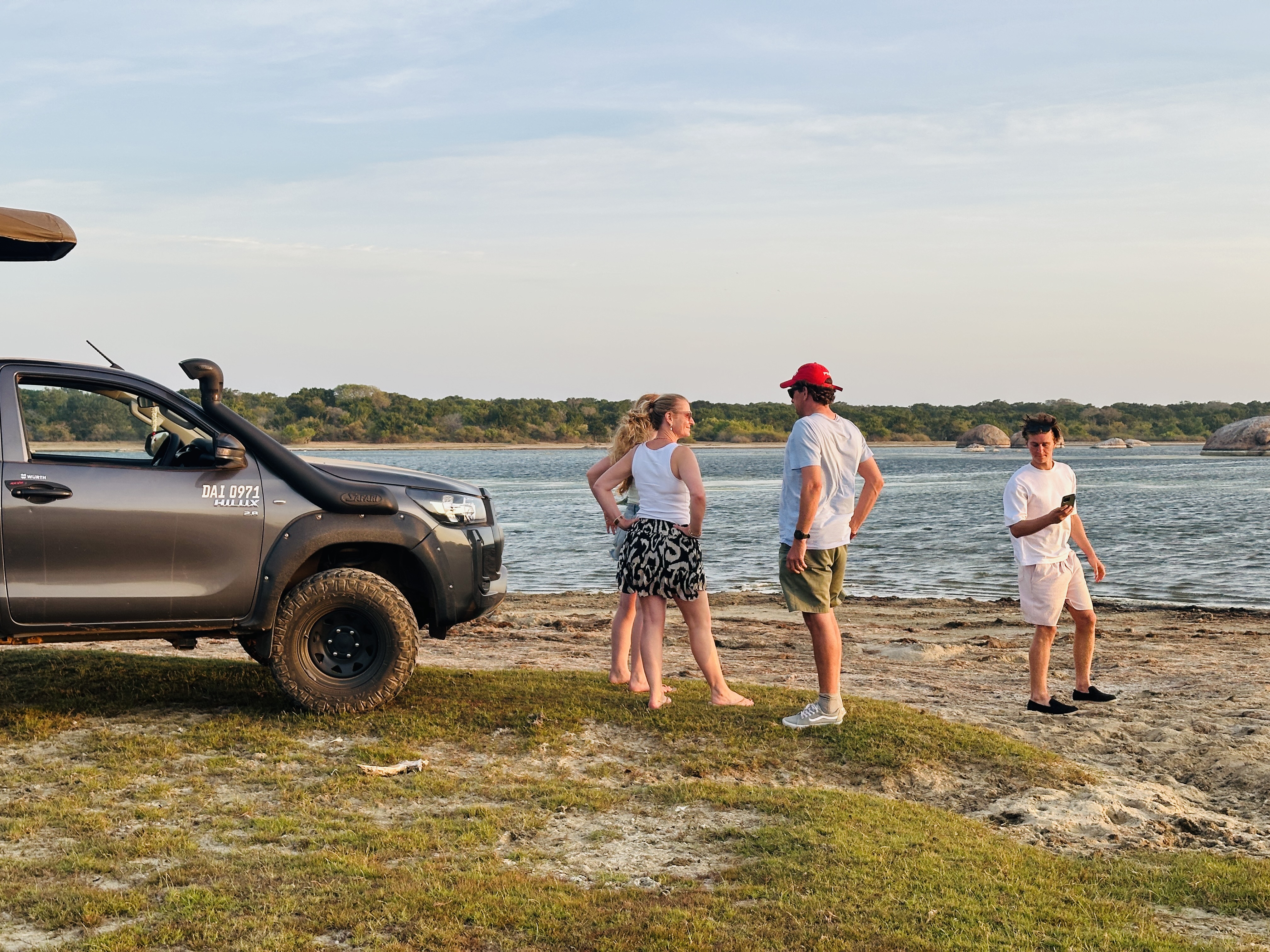 Safari guests enjoying a lakeside stop in Yala National Park